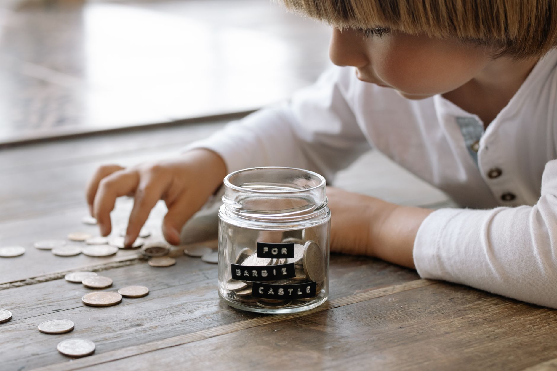 Teen and parent reviewing financial documents to open a Roth IRA for minors